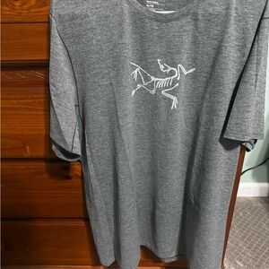 Arc'teryx Gray Short Sleeve Tee with Dinosaur Logo